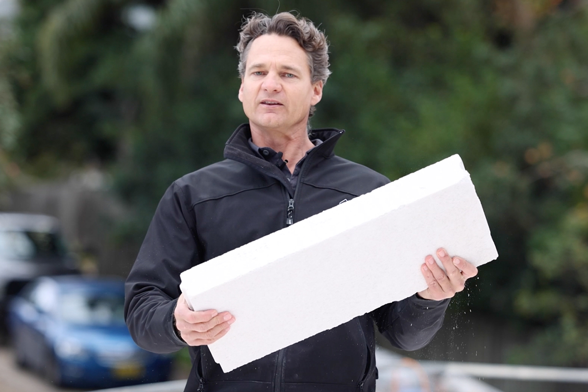 Adam Krajc, the Director of Rosewood Homes, holding Hebel PowerFloor